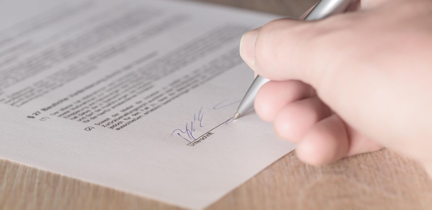 Vertrag Unterschrift